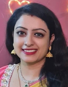 Nisha Krishnan as Journalist