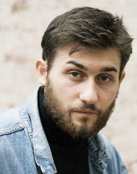 Alex Bude as The Roommate