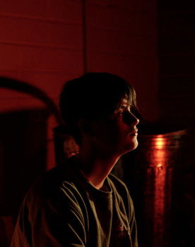 Finn Hawtin as Extra #1