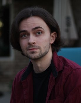 Zack Dodson as Reporter 1