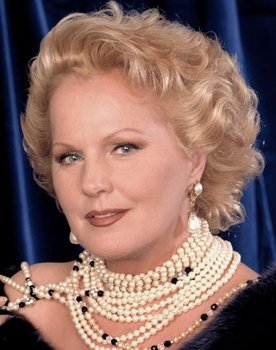 Katia Ricciarelli as Amelia, Renato's wife