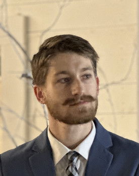 Koby Cormier as Unnamed Conspiracist