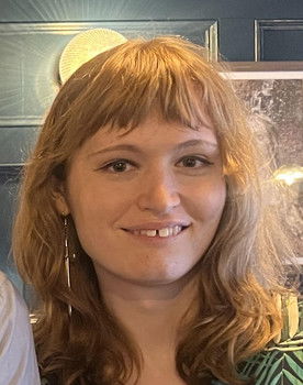 Lily Paris as The Hand