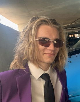 Austin Baltes as The Milkman