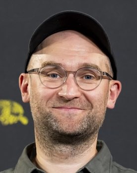 Laurynas Bareiša as Passer-by in the shop