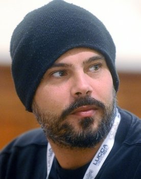 Marco D'Amore as Roberto Santini