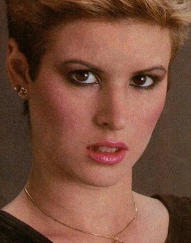 Lois Ayres as Sandy (segment "Taking Off with Kitten Natividad")