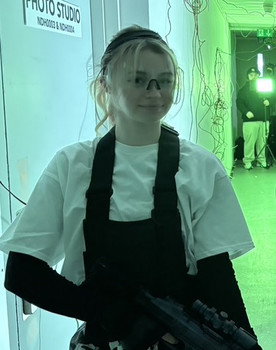 Hannah Button as Guard 2