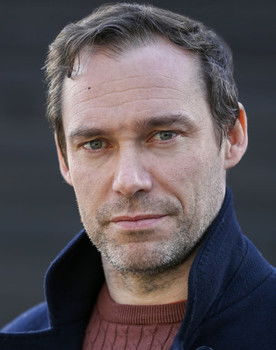 Niall Kenny as Adrian