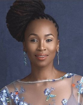 Claire Mawisa as Presenter