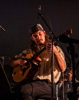 Joakim Nat as Violin Bard