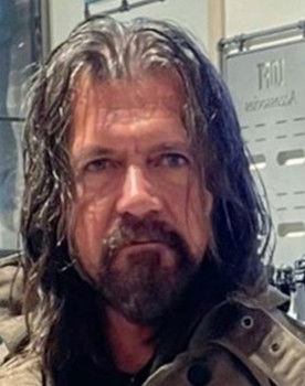 Gokhan Toprak as John