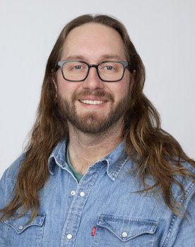 Lucas Ostrowski as Coach Jones