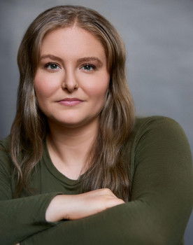 Haley Sanders as Michaela