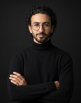 YAHYA EL MOUAHHID as The Businessman