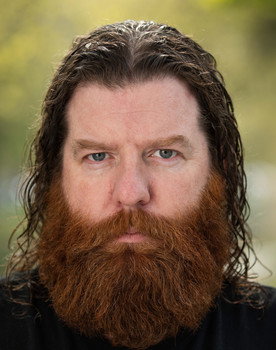 Wayne Byrne as John Lyons