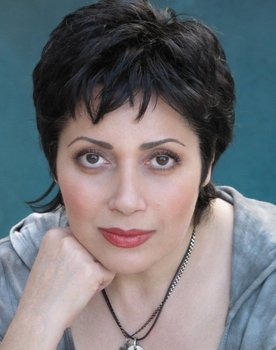 Rosie Malek-Yonan as Iberian Airline Clerk