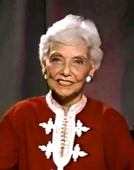 Elda Hartley as Herself / Presenter