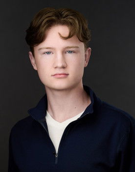 Ethan Doyle as Extra