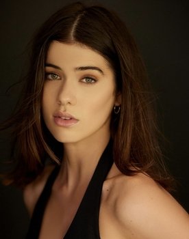 Shelley Q. as Karissa