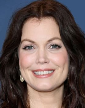 Bellamy Young as Karen Warner