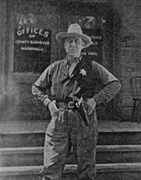 Walter James as Officer Timothy Rooney