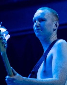 Gus Romer as Himself, Bass