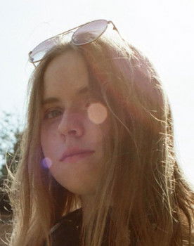 Olha Savchenko as A Woman