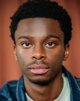 Abdul Sessay as Dev