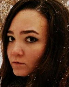 Andreea Bosneag as Delia Cristina Fratila