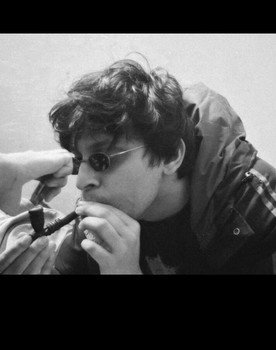 Tanmay Jha as The Voice