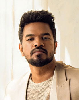 Madan Gowri as Editor Vinodh