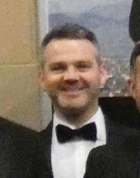 Mark Stinson as Iain Wainwright