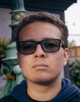 Luke Sell as Student