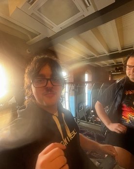 Louis Noon as Reporter