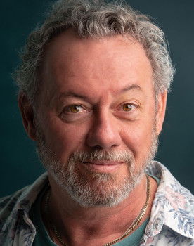 John MacNeill as Father Charles