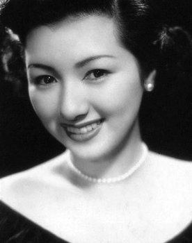 Hideko Takamine as Sakanishi Kazuko, Shingo's wife
