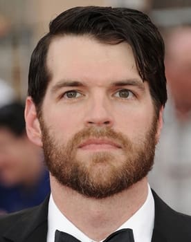 Timothy Simons as Father Murphy