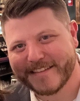 Justin Collins as Charles