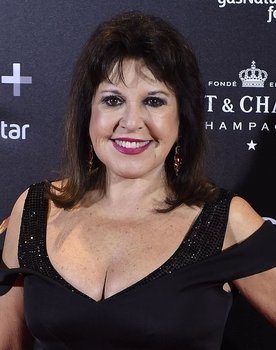 Loles León as Trini