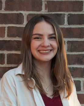 Hannah Johnson as Ms. Johnson