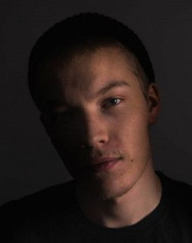 Versace Henrik as The Squad Guy