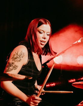 Eliza Enman-McDaniel as Self - Drums