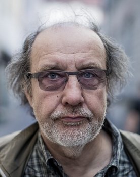 Roman Baskin as Theatre Director