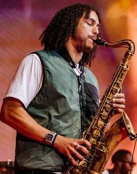 James Mollison as Self : Saxophone