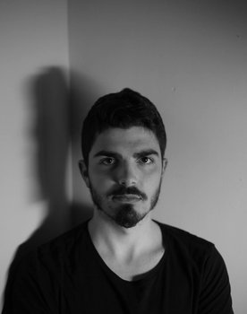 Manolis Halkos as Christos' Friend