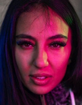 Liz as Self - Rapper