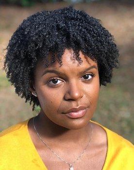 Naire Poole as Andrea