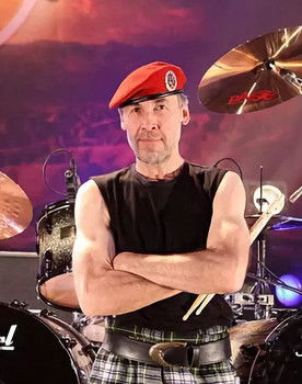 C.C. Behrens as Drums