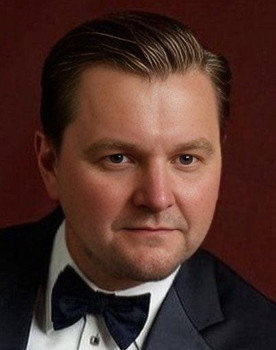 Giedrius Arbačiauskas as Voice in the headphones